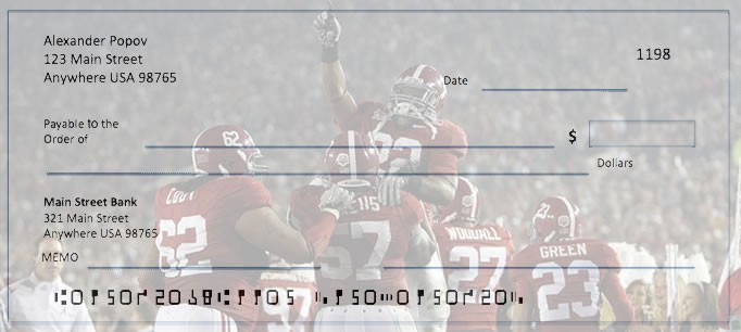 Earlier photo-check illustration showing Alabama football players celebrating on the field